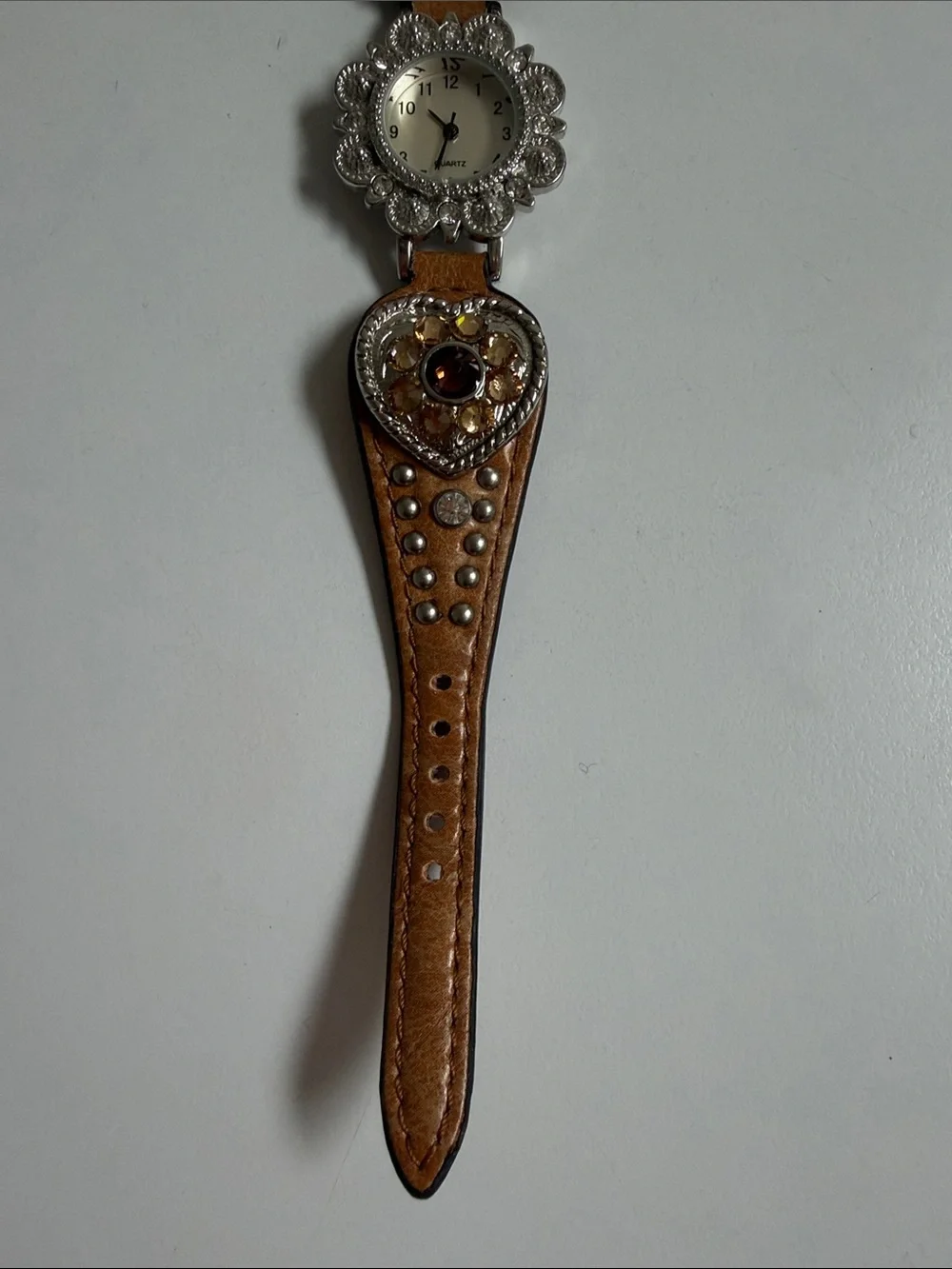 Source Unknown Brown Leather Wristwatch  Silver-Tone Floral Bezel needs battery
